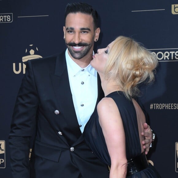 Adil Rami et sa compagne Pamela Anderson au photocall de la 28ème cérémonie des trophées UNFP (Union nationale des footballeurs professionnels) au Pavillon d'Armenonville à Paris, France, le 19 mai 2019. © Coadic Guirec/Bestimage