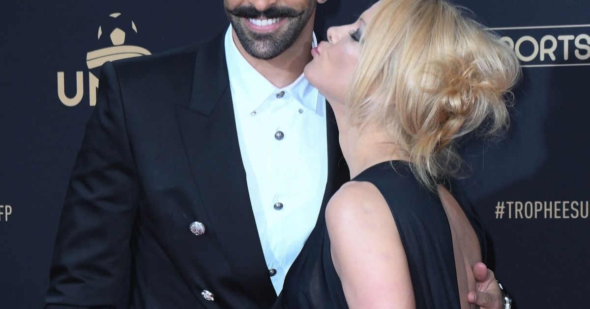 Adil Rami et sa compagne Pamela Anderson au photocall de la 28ème ...