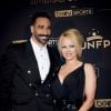 Adil Rami et sa compagne Pamela Anderson au photocall de la 28ème cérémonie des trophées UNFP (Union nationale des footballeurs professionnels) au Pavillon d'Armenonville à Paris, France, le 19 mai 2019.