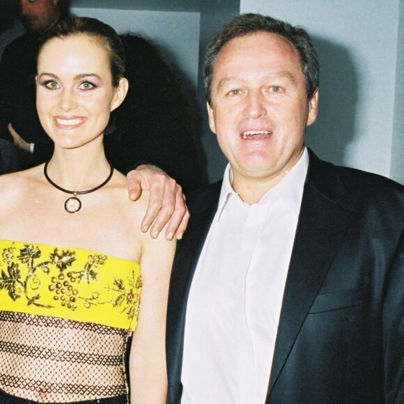 Johnny et Laeticia Hallyday et André Boudou lors de l'inauguration de L'Amnésia, le 1er octobre 2003.