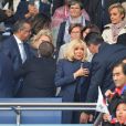 Le président de la République Emmanuel Macron et la première dame Brigitte Macron - People dans les tribunes du parc des Princes pour l'ouverture de la coupe du monde féminine de football 2019 (Mondial), opposant la France à la Corée du Sud. Paris le 7 juin 2019 © Pierre Perusseau / Bestimage