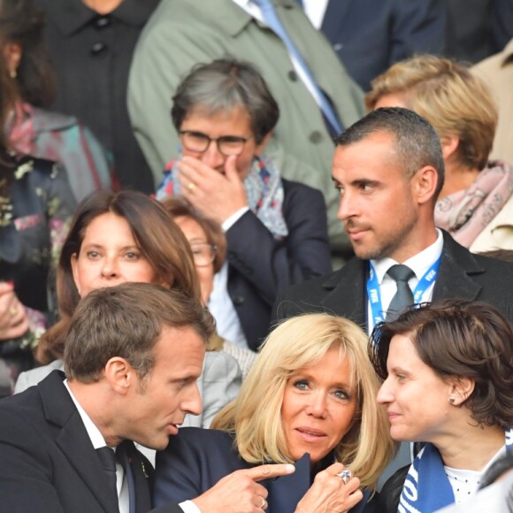 Le président de la République Emmanuel Macron et la première dame Brigitte Macron - People dans les tribunes du parc des Princes pour l'ouverture de la coupe du monde féminine de football 2019 (Mondial), opposant la France à la Corée du Sud. Paris le 7 juin 2019 © Pierre Perusseau / Bestimage