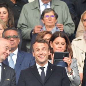 Le président de la République Emmanuel Macron et la première dame Brigitte Macron assistent à l'ouverture de la coupe du monde féminine de football 2019 (Mondial), opposant la France à la Corée du Sud au Parc des Princes. Paris le 7 juin 2019 © Pierre Perusseau / Bestimage