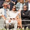 Dominique Desseigne et Alexandra Cardinale assistent à la demi-finale simple messieurs Djokovic - Thiem lors des internationaux de France de tennis de Roland Garros à Paris, France, le 8 juin 2019.