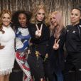 Adele rencontre les Spice Girls, Emma Bunton, Mel B (Melanie Brown), Melanie C (Melanie Chisholm), Geri Horner (Geri Halliwell),en backstage de leur dernier concert dans le cadre de leur tournée Spice World UK au stade de Wembley à Londres, Royaume Uni, le 15 juin 2019.