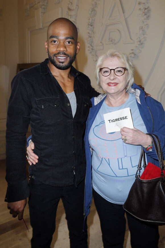 Josiane Balasko et son fils adoptif Rudy - People au defilé Jean-Paul Gaultier lors de la fashion week Haute-Couture Automne-Hiver 2013/2014. A Paris le 3 juillet 2013.