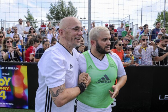 Pascal Obispo et Malik Bentalha lors de la grande finale de la Z5 Cup à Aix-en-Provence, France, 23 juin 2019. © Norbert Scanella/Panoramic/Bestimage