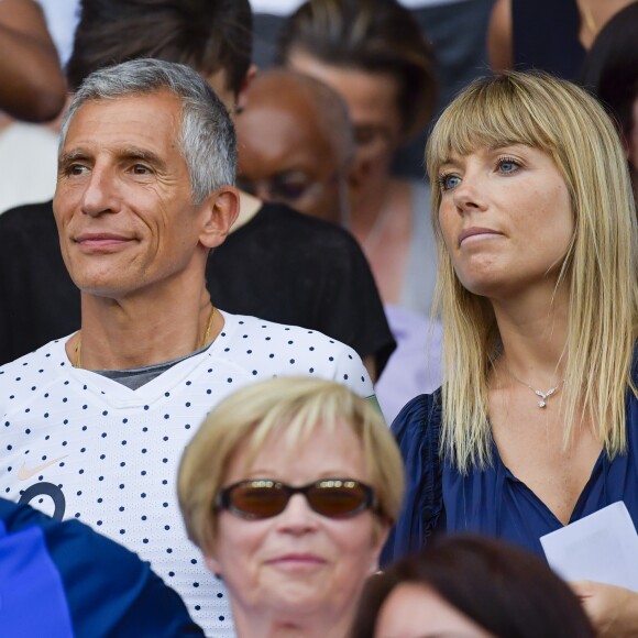 Nagui et Mélanie Page dans les tribunes lors du quart de finale de la Coupe du Monde Féminine de football opposant les Etats-Unis à la France au Parc des Princes à Paris, France, le 28 juin 2019. Les USA ont gagné 2-1. © Pierre Perusseau/Bestimage