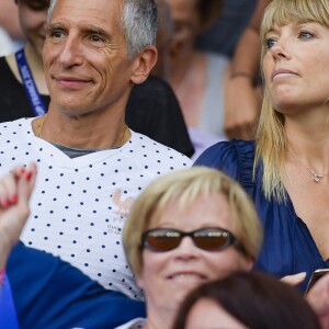 Nagui Fam et Mélanie Page dans les tribunes lors du quart de finale de la Coupe du Monde Féminine de football opposant les Etats-Unis à la France au Parc des Princes à Paris, France, le 28 juin 2019. Les USA ont gagné 2-1. © Pierre Perusseau/Bestimage