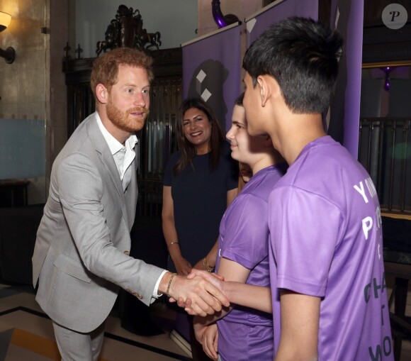 Le prince Harry assiste à l'événement caritatif "Diana Award National Youth Mentoring Summit" à Londres, le 2 juillet 2019.