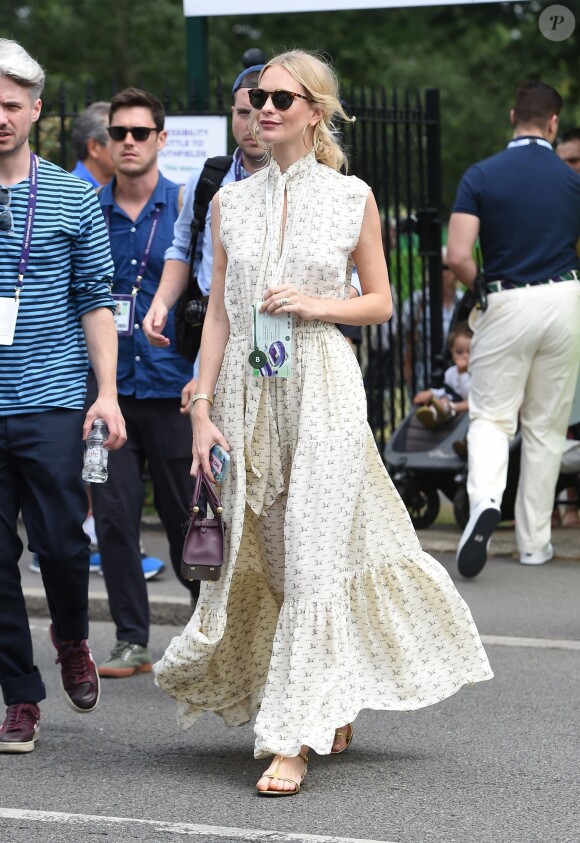 Le mannequin britannique Poppy Delevingne assiste au tournoi de Wimbledon, le 8 juillet 2019.