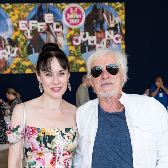 Exclusif - Hugues Aufray, sa compagne Muriel - Tente VIP - Longines Paris Eiffel Jumping au Champ de Mars à Paris, le 6 juillet 2019. © Luc Castel/Bestimage