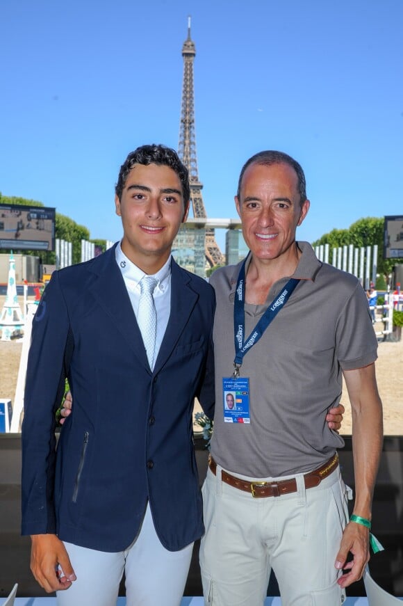Exclusif - Inigo Lopez de la Osa Escribano et son fils Inigo Lopez de la Osa Franco - People dans la tente VIP lors du Longines Paris Eiffel Jumping au Champ de Mars à Paris, le 6 juillet 2019.
