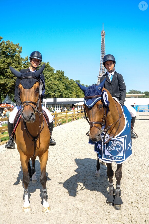 Exclusif - Félicité Herzog pose avec son fils Louis Weinberg Herzog, vainqueur du Prix Joone lors du Longines Paris Eiffel Jumping au Champ de Mars à Paris, France, le 6 juillet 2019. © Pierre Perusseau/Bestimage