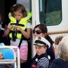 Le prince George de Cambridge (Grimace), la princesse Charlotte - Les enfants du duc et de la duchesse de Cambridge regardent d'un bateau la régate King's Cup le 8 août 2019.