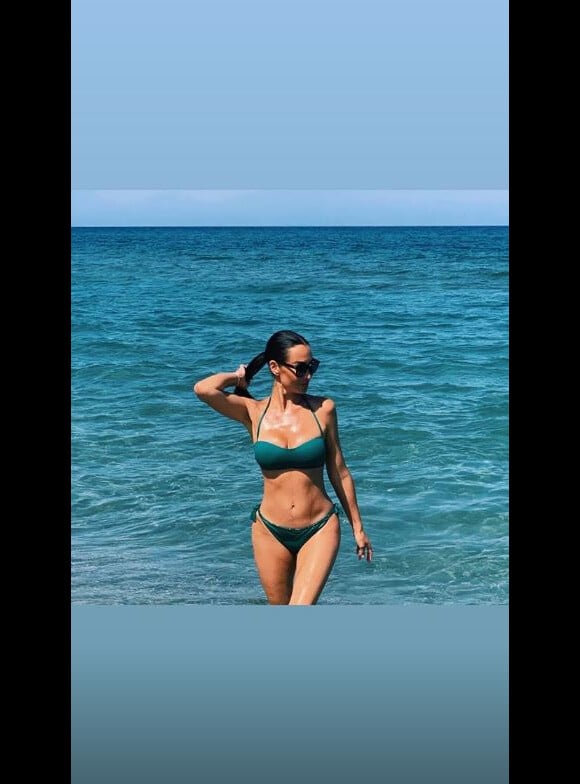 Sidonie Biémont en bikini lors de ses vacances avec ses jumeaux Zayn et Madi. Le 14 août 2019.