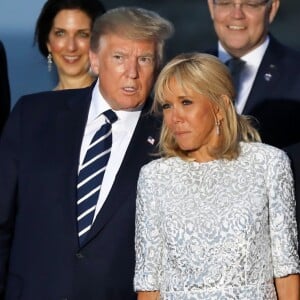 Le président américain Donald Trump avec sa femme Melania Trump, le président français Emmanuel Macron avec sa femme Brigitte Macron, La chancelière allemande Angela Merkel - Les dirigeants du G7 et leurs invités posent pour une photo de famille lors du sommet du G7 à Biarritz, France, le 25 août 2019. © Dominique Jacovides/Bestimage