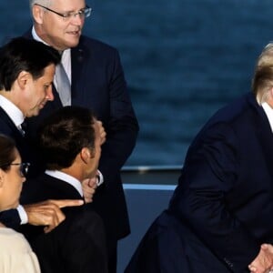 Le président américain Donald Trump et la chancelière allemande Angela Merkel - Les dirigeants du G7 et leurs invités posent pour une photo de famille lors du sommet du G7 à Biarritz, France, le 25 août 2019. © Stéphane Lemouton/Bestimage