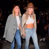 Miley Cyrus et Kaitlynn Carter arrivent à l'Up & Down pour l'after party des MTV Video Music Awards. New York, le 26 août 2019.