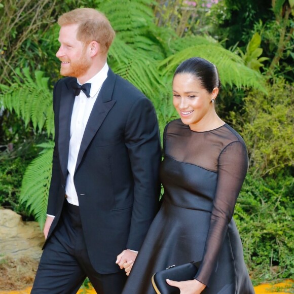 Le prince Harry, duc de Sussex, et Meghan Markle, duchesse de Sussex, à la première du film "Le Roi Lion" au cinéma Odeon Luxe Leicester Square à Londres, le 14 juillet 2019.