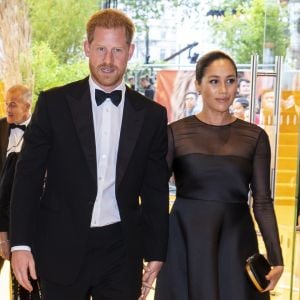 Le prince Harry, duc de Sussex, et Meghan Markle, duchesse de Sussex, à la première du film "Le Roi Lion" au cinéma Odeon Luxe Leicester Square à Londres, le 14 juillet 2019.