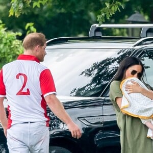 Le prince Harry, duc de Sussex, Meghan Markle, duchesse de Sussex et leur fils Archie Harrison Mountbatten-Windsor lors d'un match de polo de bienfaisance King Power Royal Charity Polo Day à Wokinghan, comté de Berkshire, Royaume Uni, le 10 juillet 2019.