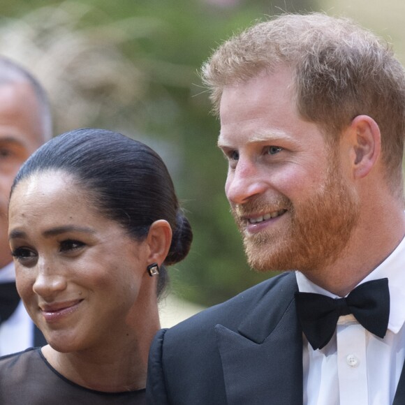 Le prince Harry, duc de Sussex, et Meghan Markle, duchesse de Sussex, à la première du film "Le Roi Lion" au cinéma Odeon Luxe Leicester Square à Londres, le 14 juillet 2019.