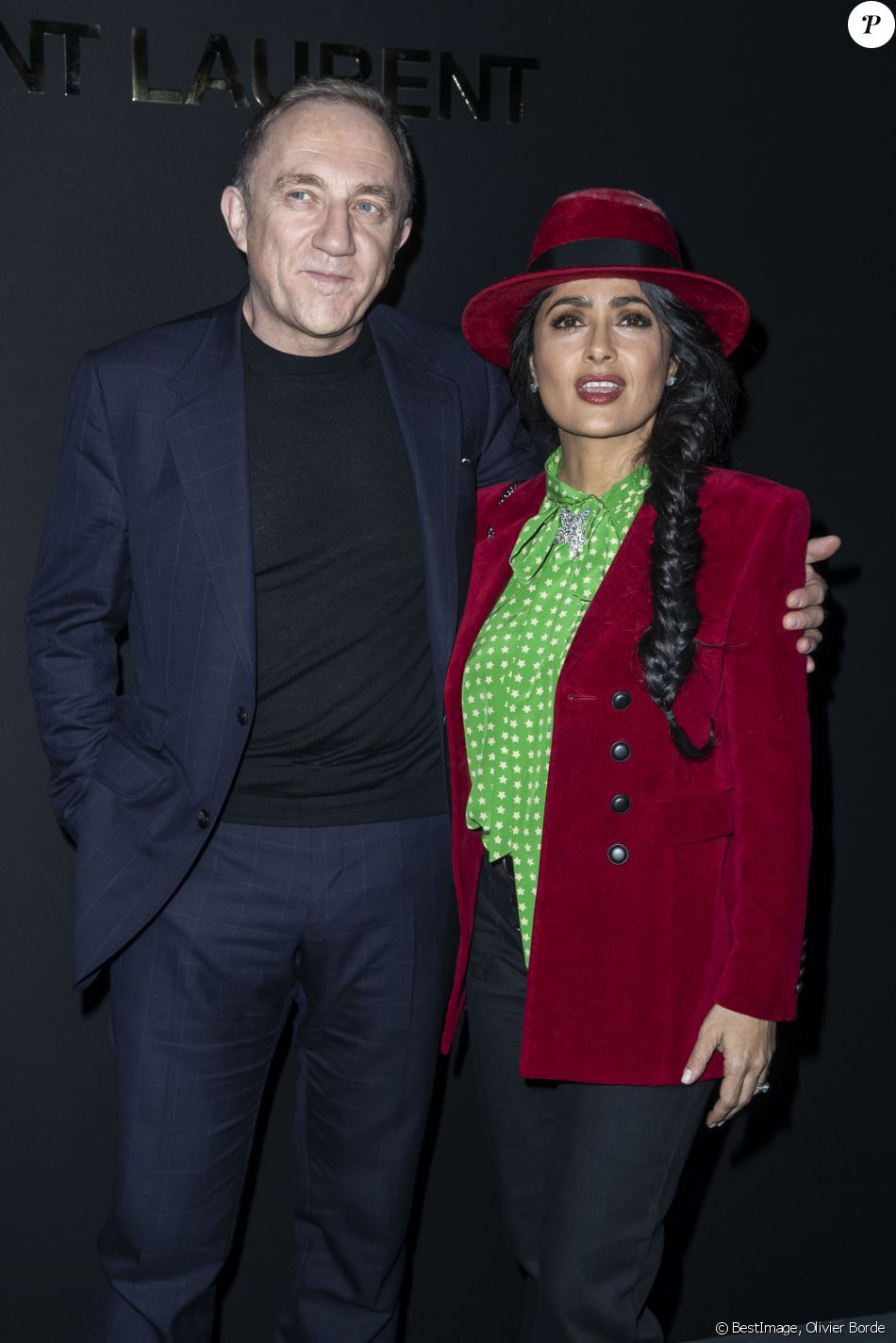 FrançoisHenri Pinault et sa femme Salma Hayek au Photocall du défilé