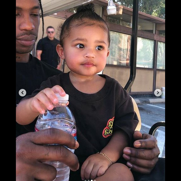 Travis Scott et sa fille Stormi Webster. Juillet 2019.