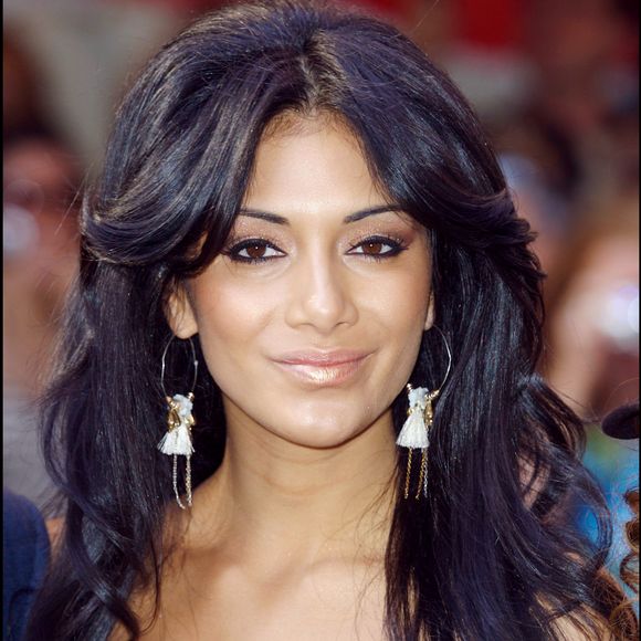 Nicole Scherzinger - Le groupe Pussycat Dolls participe au lancement des soldes d'été chez Harrods, Londres, le 3 juillet 2006.