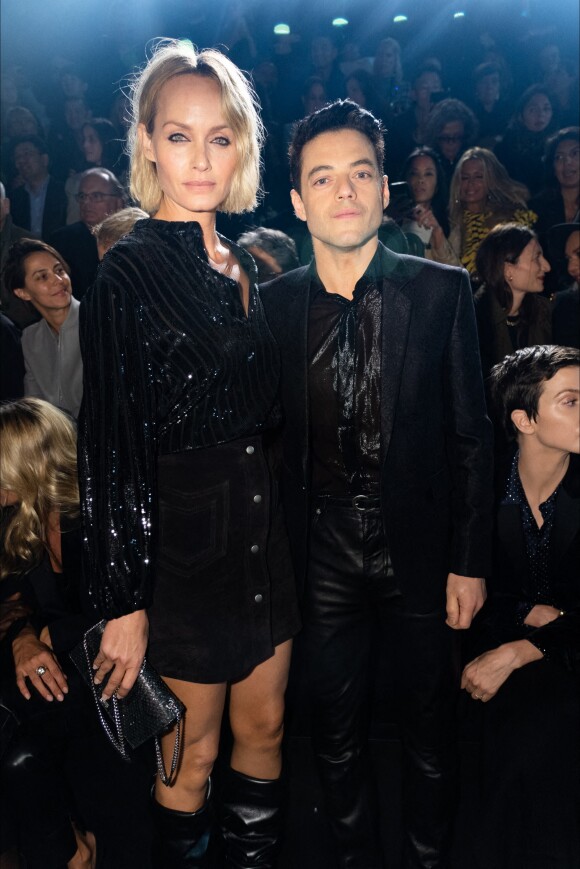 Amber Valletta et Rami Malek assistent au défilé de mode printemps-été 2020 de Saint Laurent à Paris. Le 24 septembre 2019.