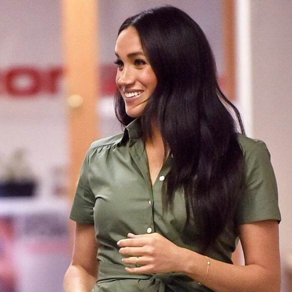 Meghan Markle, duchesse de Sussex, visite une école de Johannesburg où les élèves sont sensibilisés contre la violence faite aux jeunes filles par une association locale, le 30 septembre 2019.