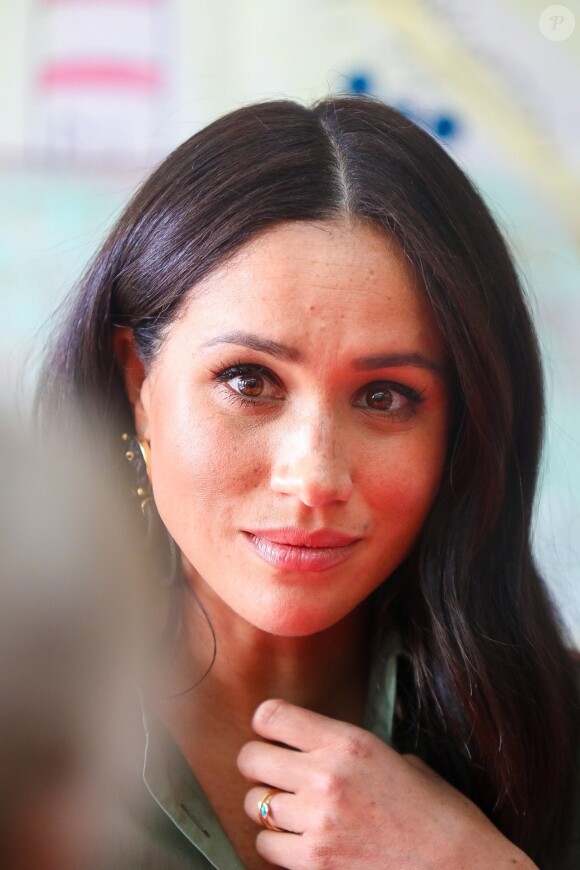 Meghan Markle, duchesse de Sussex, visite une école de Johannesburg où les élèves sont sensibilisés contre la violence faite aux jeunes filles par une association locale, le 30 septembre 2019.