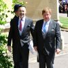 David Furnish et Elton John - Les invités au mariage du prince Harry et Meghan Markle à la sortie de la chapelle St. George au château de Windsor, Royaume Uni, le 19 mai 2018.