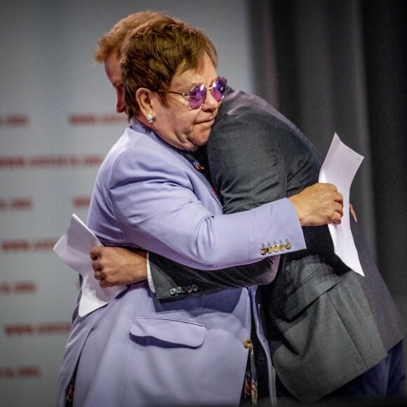 Elton John et le prince Harry participent à la conférence internationale "AIDS" à Amsterdam aux Pays-Bas le 24 juillet 2018.