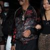 Dennis Graham, le père du rappeur Drake, aperçu en compagnie d'une mystérieuse jeune femme devant le club "Poppy" à West Hollywood, le 20 juin 2019.