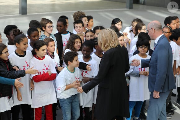 Brigitte Macron - Dictée d'ELA lors de sa 16e édition au Collège Suzanne Lacore, à Paris, le 14 octobre 2019. Cette dictée est le lancement officiel de la campagne "Mets Tes Baskets et bats la maladie" à l'école. ©Dominique Jacovides/Bestimage