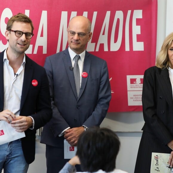 Nicolas Mathieu (Goncourt 2018), auteur de la dictée d'ELA, Jean-Michel Blanquer, ministre de l'éducation nationale, Brigitte Macron - Dictée d'ELA lors de sa 16e édition au Collège Suzanne Lacore, à Paris, le 14 octobre 2019. Cette dictée est le lancement officiel de la campagne "Mets Tes Baskets et bats la maladie" à l'école. ©Dominique Jacovides/Bestimage