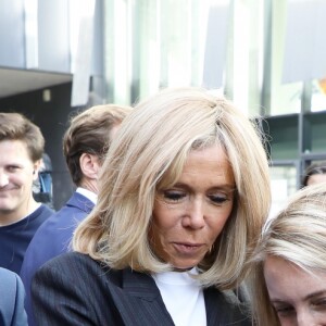 Mounir Mahjoubi, député, Jean-Michel Blanquer, ministre de l'éducation nationale, Brigitte Macron, Guy Alba, le président de l'association ELA, Léonie, âgée de 14 ans accompagnée de ses parents (Francis et Stéphanie) - Dictée d'ELA lors de sa 16e édition au Collège Suzanne Lacore, à Paris, le 14 octobre 2019. Cette dictée est le lancement officiel de la campagne "Mets Tes Baskets et bats la maladie" à l'école. ©Dominique Jacovides/Bestimage