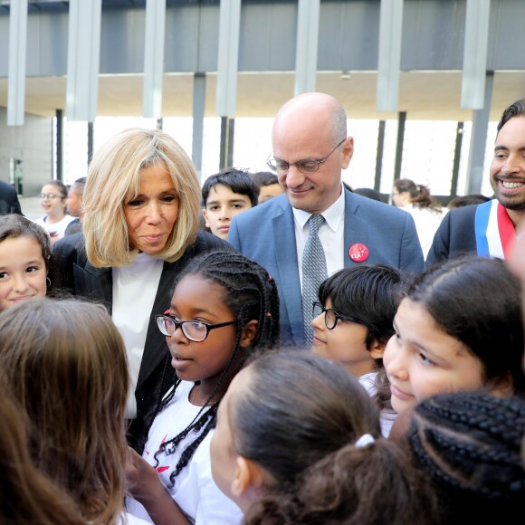 Brigitte Macron, Jean-Michel Blanquer, ministre de l'éducation nationale - Dictée d'ELA lors de sa 16e édition au Collège Suzanne Lacore, à Paris, le 14 octobre 2019. Cette dictée est le lancement officiel de la campagne "Mets Tes Baskets et bats la maladie" à l'école. ©Dominique Jacovides/Bestimage