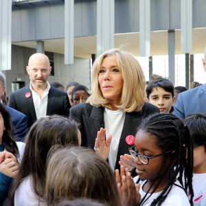 Brigitte Macron, Jean-Michel Blanquer, ministre de l'éducation nationale lors de la dictée d'ELA - Dictée d'ELA lors de sa 16e édition au Collège Suzanne Lacore, à Paris, le 14 octobre 2019. Cette dictée est le lancement officiel de la campagne "Mets Tes Baskets et bats la maladie" à l'école. ©Dominique Jacovides/Bestimage