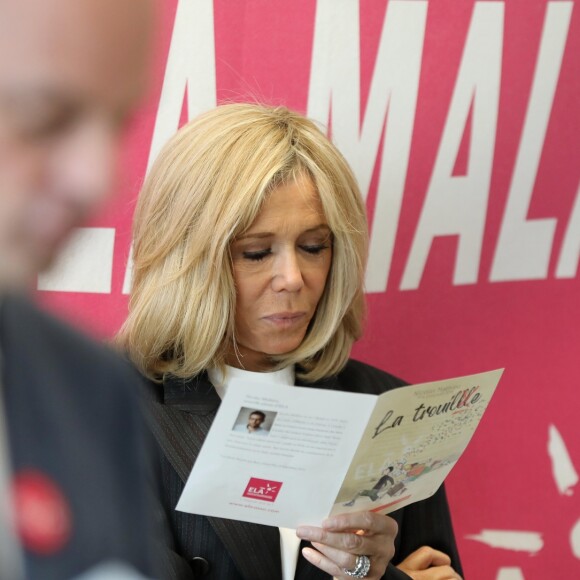 Jean-Michel Blanquer, ministre de l'éducation nationale, Brigitte Macron - Dictée d'ELA lors de sa 16e édition au Collège Suzanne Lacore, à Paris, le 14 octobre 2019. Cette dictée est le lancement officiel de la campagne "Mets Tes Baskets et bats la maladie" à l'école. ©Dominique Jacovides/Bestimage