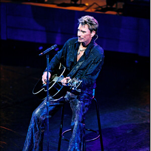 Exclusif - Johnny Hallyday sur scène en concert à l'Olympia à Paris en juillet 2000.