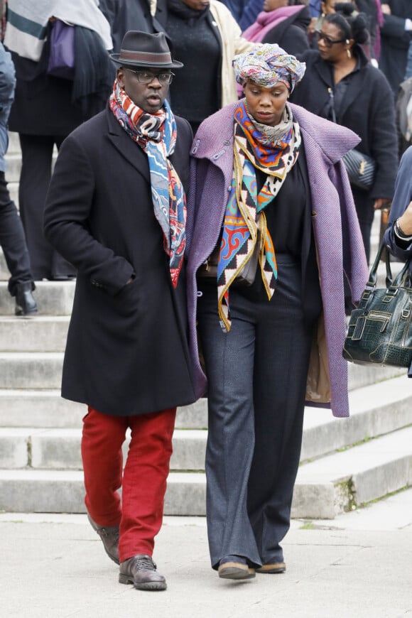 Lilian Thuram et sa compagne Kareen Guiock - Arrivées et sorties des obsèques de Jean-Michel Martial au cimetière du Père Lachaise à Paris. Le 23 octobre 2019.