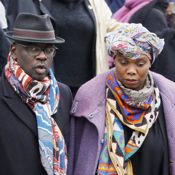 Lilian Thuram et sa compagne Kareen Guiock - Arrivées et sorties des obsèques de Jean-Michel Martial au cimetière du Père Lachaise à Paris. Le 23 octobre 2019.