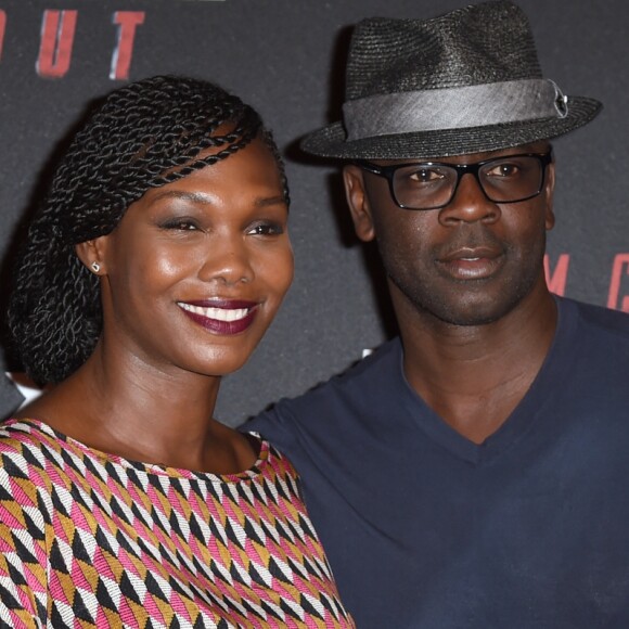 Lilian Thuram et sa compagne Kareen Guiock au photocall lors de l'avant-première mondiale de "Mission: Impossible Fallout" au Palais de Chaillot à Paris, le 12 juillet 2018. © Giancarlo Gorassini/Bestimage