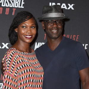 Lilian Thuram et sa compagne Kareen Guiock au photocall lors de l'avant-première mondiale de "Mission: Impossible Fallout" au Palais de Chaillot à Paris, le 12 juillet 2018. © Giancarlo Gorassini/Bestimage