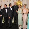 Thomas Langmann, Jean Dujardin, Michel Hazanavicius, James Cromwell, Uggie, Berenice Bejo, Penelope Ann Miller, Missi Pyle aux Oscars en février 2012 à Los Angeles.