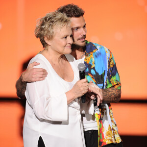 Exclusif - Muriel Robin, Matt Pokora (M.Pokora) - Enregistrement de l'émission TV "La Chanson Secrète 3", qui sera diffusée le vendredi 1er novembre à 21h00 sur TF1. Après le succès de la première édition, "La Chanson Secrète", présentée par N.Aliagas et produite par DMLS TV, revient sur TF1. 10 artistes ne savent rien de ce qui va se passer pour eux ! Ils ont accepté de jouer le jeu, de se laisser totalement surprendre, émouvoir, parfois même déstabiliser car ils vont découvrir en même temps que les téléspectateurs une surprise : une chanson qui leur rappelle un souvenir important de leur vie revisitée et réinterprétée par un artiste. Les téléspectateurs seront aux premières loges pour vivre ces moments d'intimité musicale rare. Et, en bonus, de nombreux invités inattendus et des proches de l'artiste assis dans le fauteuil viendront l'émouvoir. Le 25 juin 2019 © Gaffiot-Perusseau / Bestimage