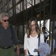 Harrison Ford avec sa femme Calista Flockhart et le fils de Calista, Liam, arrivent à l'aéroport de Los Angeles, le 28 juin 2017. © CPA/Bestimage